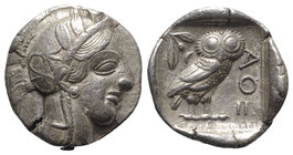 Attica, Athens, c. 454-404 BC. AR Tetradrachm (26mm, 17.11g, 12h). Helmeted head of Athena r. R/ Owl standing r., head facing; olive sprig behind; all...
