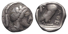 Attica, Athens, c. 454-404 BC. AR Drachm (13mm, 4.14g, 6h). Helmeted head of Athena r. R/ Owl standing r., head facing; olive sprig and crescent behin...