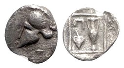 Asia Minor, Uncertain mint, c. 450 BC. AR Tetartemorion (5.5mm, 0.13g, 6h). Corinthian helmet l. R/ Amphora and Π above ivy leaf in linear square. Unp...