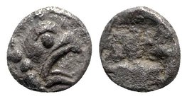 Ionia, Teos, late 6th-early 5th century BC. AR Tetartemorion (4mm, 0.22g). Head of griffin r. R/ Quadripartite incuse square. Matzke Group Bx3; Balcer...