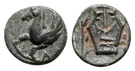 Caria, Halikarnassos, 4th-3rd century century BC. Æ (8mm, 0.56g, 3h). Forepart of Pegasos l. R/ Lyre between two laurel branches. SNG Copenhagen 337. ...