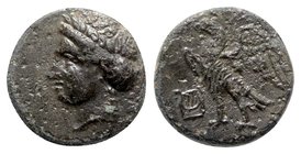 Caria, Halikarnassos, mid 4th-3rd centuries BC. Æ (10mm, 1.33g, 12h). Laureate head of Apollo l. R/ Eagle standing l.; lyre to l. SNG Copenhagen 346-7...