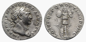 Trajan (98-117). AR Denarius (19mm, 3.24g, 6h). Rome, c. 107-8. Laureate bust r., slight drapery on l. shoulder. R/ Trophy on tree stump with one roun...