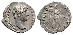 Hadrian (117-138). AR Denarius (18mm, 2.74g, 6h). Rome, 134-8. Bare head r. R/ Victory advancing r., pulling out dress and holding branch. RIC II 282;...