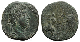 Commodus (177-192). Æ Sestertius (28mm, 23.85g, 12h). Rome, AD 191. Laureate head r. R/ Commodus standing l., sacrificing over tripod; to l., flute pl...