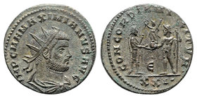 Maximianus (286-305). Radiate (21mm, 4.30g, 6h). Cyzicus, AD 293. Radiate and cuirassed bust r. R/ Jupiter presents Victory on a globe to Maximianus; ...