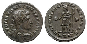 Constantine I (307/310-337). Æ Follis (22mm, 4.05g, 6h). Londinium, 310-2. Laureate and cuirassed bust r. R/ Prince standing l., holding globe and rev...