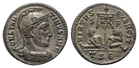 Constantine I (307/310-337). Æ Follis (18mm, 2.98g, 6h). Thessalonica, AD 320. Helmeted and cuirassed bust r. R/ Two captives seated on either side of...