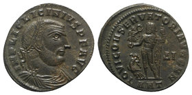 Licinius I (308-324). Æ Follis (22mm, 3.92g, 12h). Antioch, 315-6. Laureate head r. R/ Jupiter standing l. holding Victory on a globe and sceptre; at ...