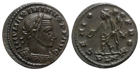 Maximinus II (310-313). Æ Follis (22mm, 4.30g, 6h). Londinium, c. 311-2. Laureate and cuirassed bust r. R/ Genius standing l., holding patera and corn...