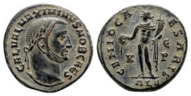 Maximinus II (Caesar, 305-309). Æ Follis (24mm, 7.35g, 12h). Alexandria, 308-9. Laureate head r. R/ Genius standing facing, head l., holding cornucopi...