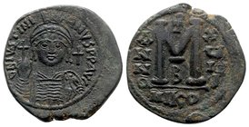 Justinian I (527-565). Æ 40 Nummi (35mm, 19.28g, 6h). Nicomedia, year 18 (544/5). Helmeted and cuirassed facing bust, holding globus cruciger and shie...