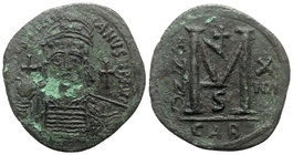 Justinian I (527-565). Æ 40 Nummi (41mm, 21.41g, 12h). Carthage, year 14 (540/1). Helmeted and cuirassed bust facing, holding globus cruciger and shie...