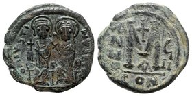 Justin II and Sophia (565-578). Æ 40 Nummi (30mm, 13.48g, 7h). Constantinople, year 8 (572/3). Nimbate figures of Justin and Sophia seated facing on d...