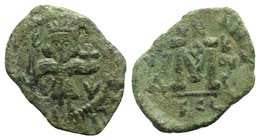 Justinian II (First reign, 685-695). Æ 40 Nummi (22mm, 3.45g, 6h). Syracuse, 693-694. Justinian standing facing, holding spear and globus cruciger; br...