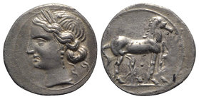 Bruttium, Carthaginian occupation, c. 216-211 BC. AR Quarter Shekel (15mm, 1.76g, 12h). Wreathed head of Tanit-Demeter l. R/ Horse standing r.; pellet...