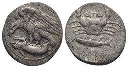 Sicily, Akragas, c. 420-406 BC. AR Hemidrachm (15mm, 1.98g, 6h). Eagle standing l. tearing at hare. R/ Crab; below, fish l. Westermark, Coinage, 542; ...
