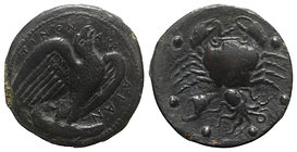 Sicily, Akragas, c. 420-406 BC. Æ Hemilitron (28mm, 20.21g, 6h). Eagle standing r. on tunny. R/ Crab; conch shell and octopus below, six pellets aroun...