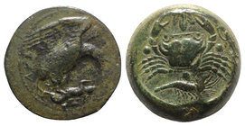Sicily, Akragas, c. 420-406 BC. Æ Tetras – Trionkion (22mm, 11.20g, 3h). Eagle standing r., head lowered, on hare held in its talons. R/ Crab; leaf ab...