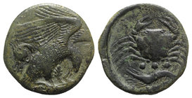 Sicily, Akragas, c. 420-406 BC. Æ Tetras – Trionkion (22mm, 10.90g, 12h). Eagle, wings raised, standing r. on, and tearing at, dead hare; crab to l. R...