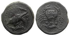 Sicily, Akragas, c. 420-406 BC. Æ Tetras – Trionkion (21mm, 9.32g, 12h). Eagle, wings raised, standing r. on, and tearing at, dead hare. R/ Crab; belo...