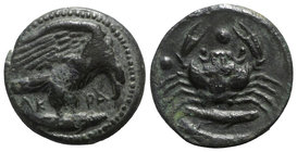 Sicily, Akragas, c. 420-406 BC. Æ Hexas (18mm, 7.85g, 7h). Eagle, with head lowered, standing r. on fish. R/ Crab; two fish r. below; pellet to l. and...