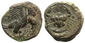 Sicily, Akragas, c. 420-406 BC. Æ Hexas (17mm, 6.61g, 6h). Eagle standing r. on serpent. R/ Crab; two pellets flanking, two fish below. Cf. Westermark...