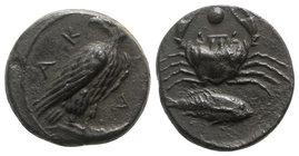 Sicily, Akragas, c. 415-406 BC. Æ Onkia (15mm, 3.28g, 11h). Eagle standing r. with head reverted, on a fish. R/ Crab; grouper below; pellet between cr...