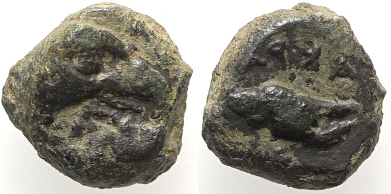 Sicily, Akragas, c. 409-406 BC. Æ (8mm, 1.27g, 12h). Head of eagle r. R/ Claw l....