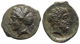 Sicily, Entella. Elymian issues, c. 420-410/4 BC. Æ (18mm, 4.08g, 9h). Head of female l., wearing sphendone; olive-spray behind. R/ Bearded male head ...