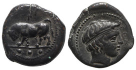 Sicily, Gela, c. 420-405 BC. Æ Tetras or Trionkion (16mm, 3.95g, 12h). Bull standing l., head lowered; Γ above. R/ Head of young river god r. CNS III,...