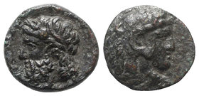 Sicily, Gela, c. 315-310 BC. Æ (11mm, 2.14g, 6h). Head of Herakles r., wearing lion skin. R/ Bearded head of Gelas l. CNS III, 56; SNG ANS -; HGC 2, 3...