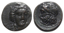 Sicily, Gela, c. 315-310 BC. Æ (12mm, 2.42g, 3h). Head of Demeter facing slightly r., wearing wreath of grain ears. R/ Horned and bearded head of Gela...