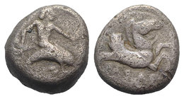 Southern Apulia, Tarentum, c. 500-480 BC. AR Nomos (15mm, 7.73g, 11h). Taras riding dolphin r., holding octopus in r. hand, l. hand extended. R/ Hippo...