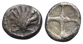 Southern Apulia, Tarentum, c. 480-470 BC. AR Litra (7mm, 0.62g). Cockle shell. R/ Wheel of four spokes. Vlasto 1108-11; HNItaly 835. Scarce, near VF