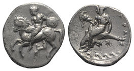 Southern Apulia, Tarentum, c. 380-340 BC. AR Nomos (22mm, 7.81g, 6h). Naked horseman dismounting l., holding small round shield and lance; Δ below. R/...