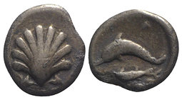 Southern Apulia, Tarentum, c. 380-325 BC. AR Litra (9mm, 0.70g). Cockle shell. R/ Dolphin swimming l.; below, fish and waves. Vlasto 1482; HNItaly 916...