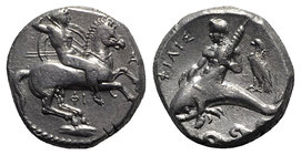 Southern Apulia, Tarentum, c. 332-302 BC. AR Nomos (20mm, 7.80g, 6h). Warrior, holding shield and two spears, preparing to cast a third, on horseback ...