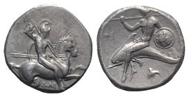 Southern Apulia, Tarentum, c. 332-302 BC. AR Nomos (20mm, 7.76g, 6h). Warrior, holding shield and two spears, preparing to cast a third, on horseback ...