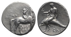 Southern Apulia, Tarentum, c. 302-280 BC. AR Nomos (21mm, 7.91g, 8h). Youth on horseback r., crowning horse; ΣA to l., APE/ΘΩN in two lines below. R/ ...