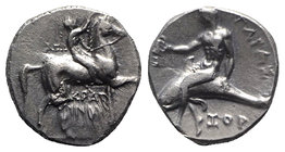 Southern Apulia, Tarentum, c. 302-280 BC. AR Nomos (20mm, 7.78g, 12h). Youth on horseback r., crowning horse; AΓΩ to l., KPAT/INOΣ below. R/ Phalantho...