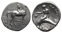 Southern Apulia, Tarentum, c. 302-280 BC. AR Nomos (21mm, 7.69g, 9h). Youth on horseback r., crowning horse with wreath. R/ Phalanthos, holding grape ...