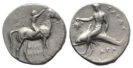 Southern Apulia, Tarentum, c. 302-280 BC. AR Nomos (21mm, 7.59g, 3h). Youth on horseback r., crowning horse with wreath; ΣA to l., [ΦIΛI/APXOΣ in two ...