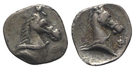 Southern Apulia, Tarentum, c. 325-280 BC. AR 3/4 Obol (8mm, 0.37g, 1h). Horse's head r.; ΦI to r. R/ Horse's head r. Cf. Vlasto 1696ff.; HNItaly 981. ...