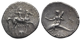 Southern Apulia, Tarentum, c. 280-272 BC. AR Nomos (23mm, 6.17g, 6h). Youth on horseback r., crowning self; ΣΩ to l., ΞAΛO and Ionic capital below. R/...