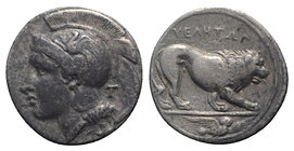 Northern Lucania, Velia, c. 400-340 BC. AR Didrachm (22mm, 7.44g, 3h). T Group. Head of Athena l., wearing crested Attic helmet decorated with griffin...