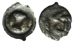 Moesia, Istros, late 5th century BC. Cast Æ (10mm, 1.14g). Wheel of four spokes (‘solar disk’). R/ IΣT (ethnic). AMNG I 534; SNG BM Black Sea 224; SNG...