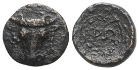 Phokis, Federal Coinage, c. 347-346 BC. Æ (12mm, 1.88g, 3h). Struck under Phalaikos. Head of bull facing, fillets hanging from ears. R/ ΦΩ within wrea...