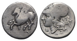 Corinth, c. 375-300 BC. AR Stater (20mm, 8.59g, 12h). Pegasos flying l. R/ Helmeted head of Athena l.; Δ-I flanking neck truncation; behind, Artemis r...