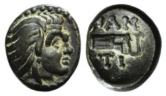 Cimmerian Bosporos, Pantikapaion, c. 310-304/3 BC. Æ (13mm, 2.07g, 12h). Beardless head of satyr r. R/ Bow in bowcase. MacDonald 72; HGC 4, 135. Green...